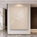 Sculptural textured wall art featuring modern geometric patterns that create depth and visual interest.